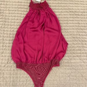Free people pink bodysuit size L new with tags